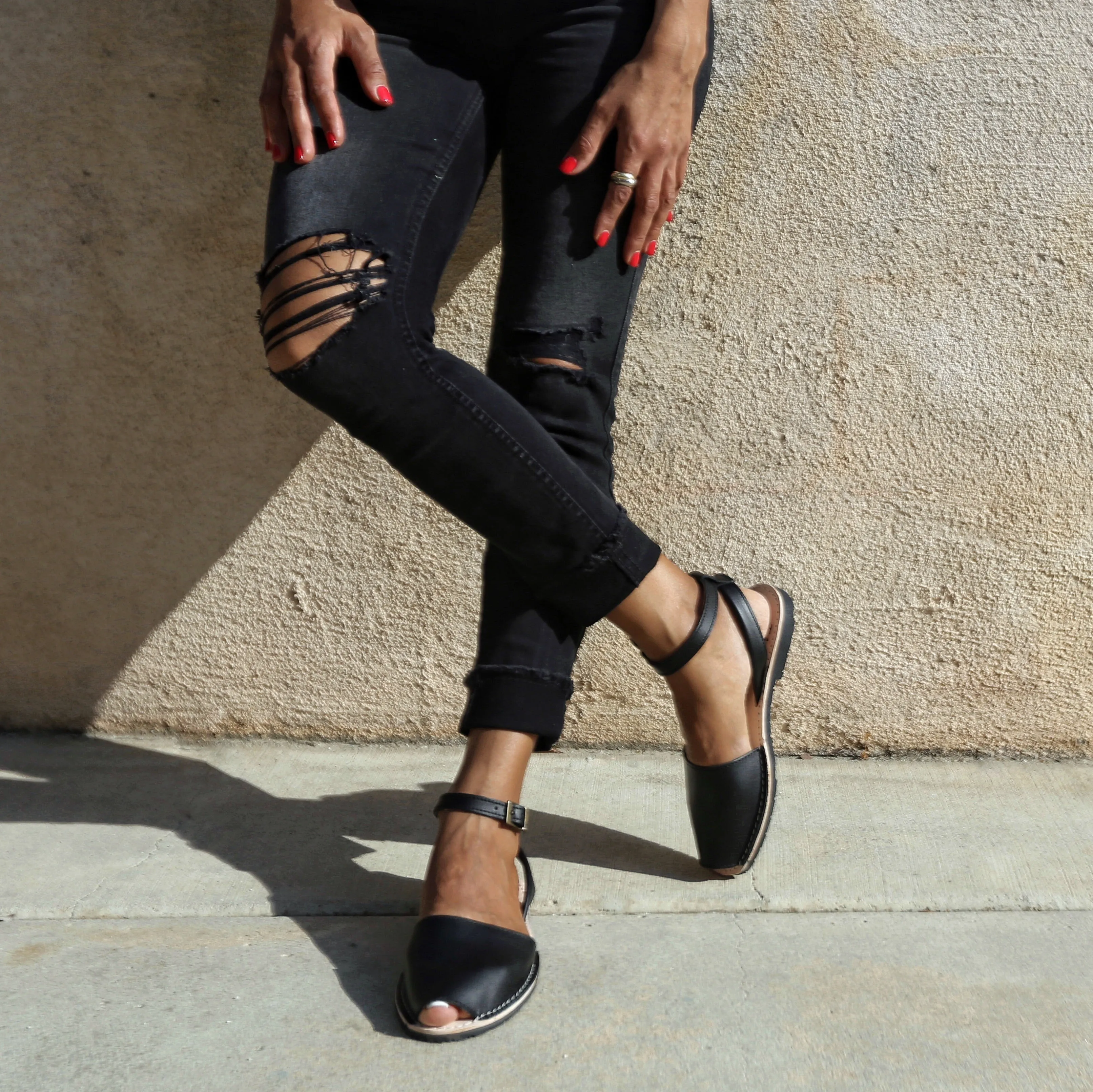 Black sandals with strap