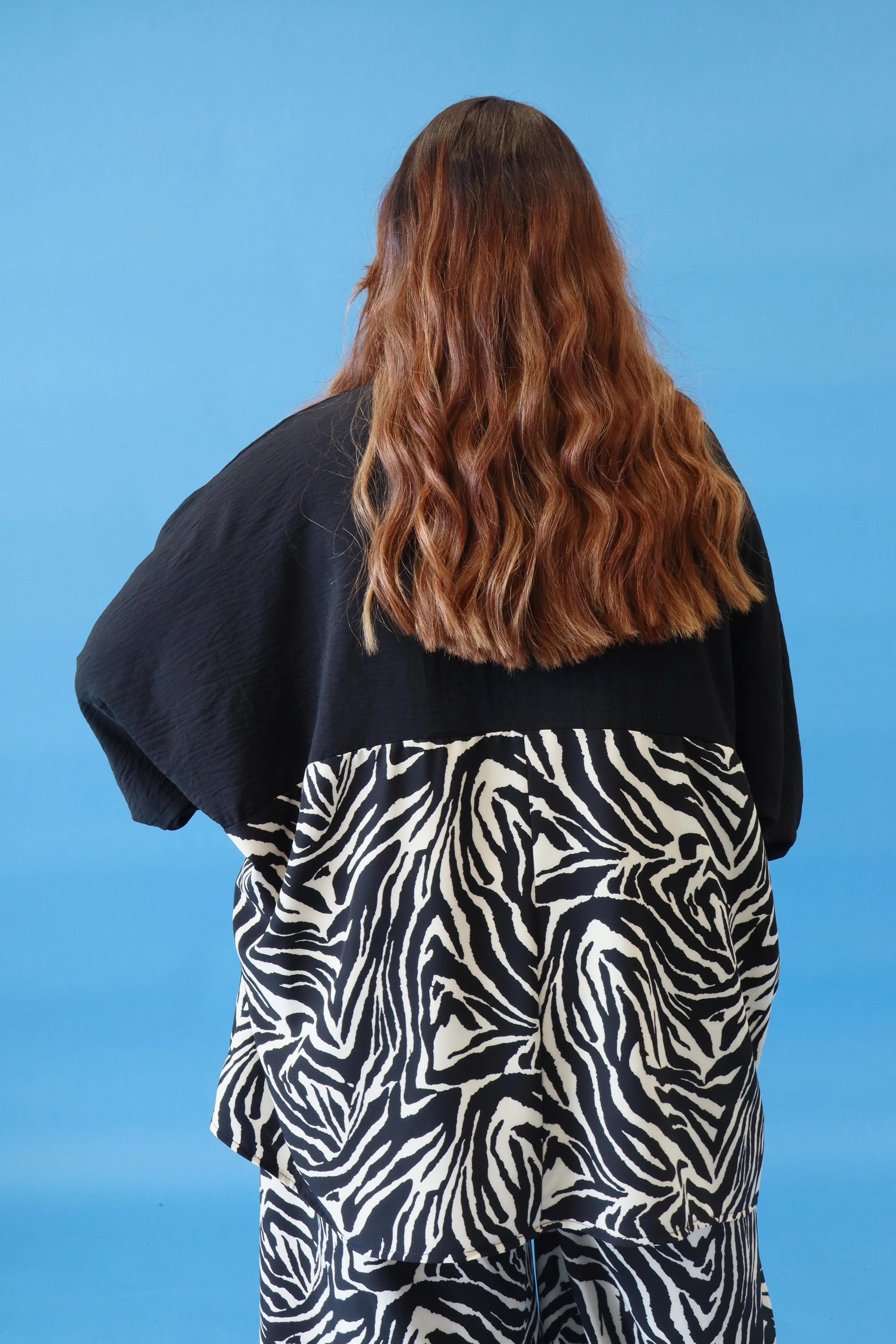 Ella Oversized Blouse in Black Zebra Print