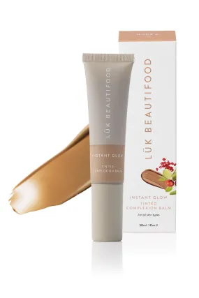 Instant Glow Skin Tint: 6 - Tan